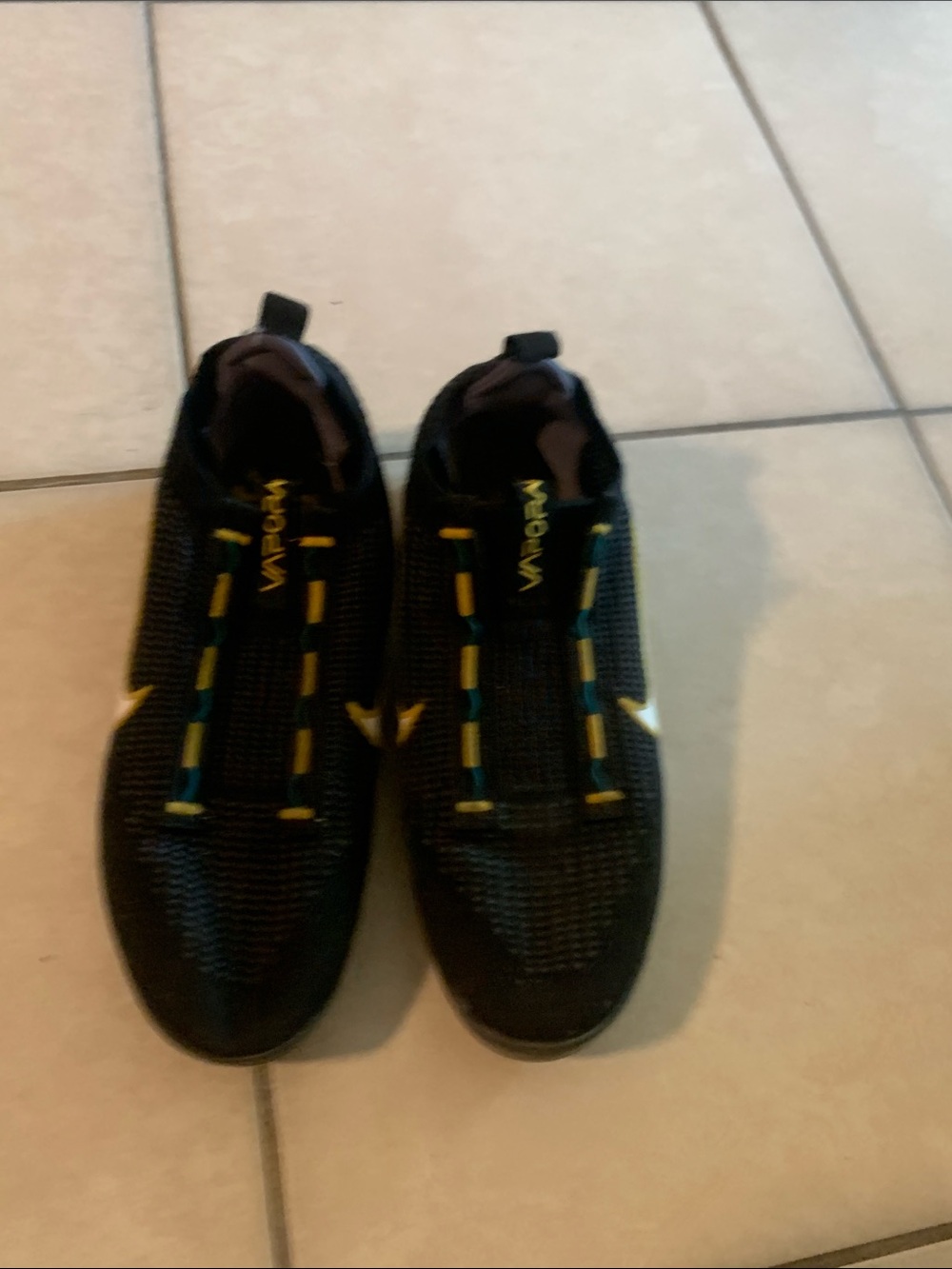 Nike Men’s Black Athletic Slip-On Sneakers with Yellow Accents